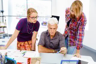 Business team working together in office.jpeg